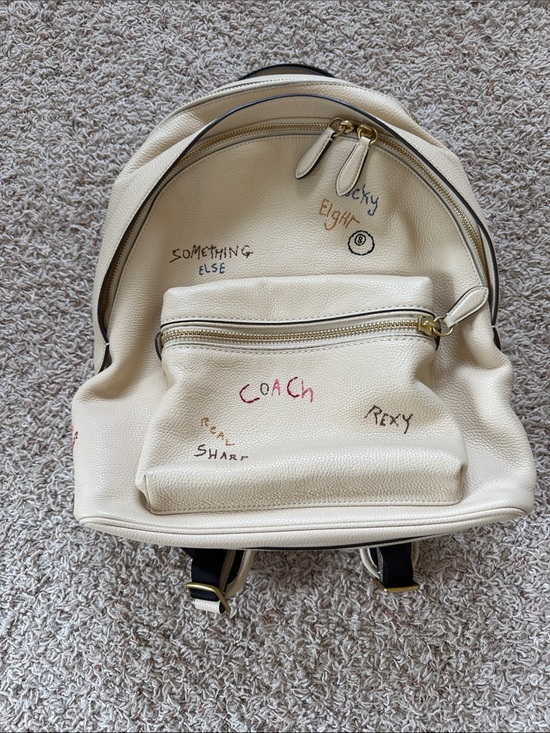 Coach Handbags - Coach Cream Leather Backpack with Multicolor Script Details